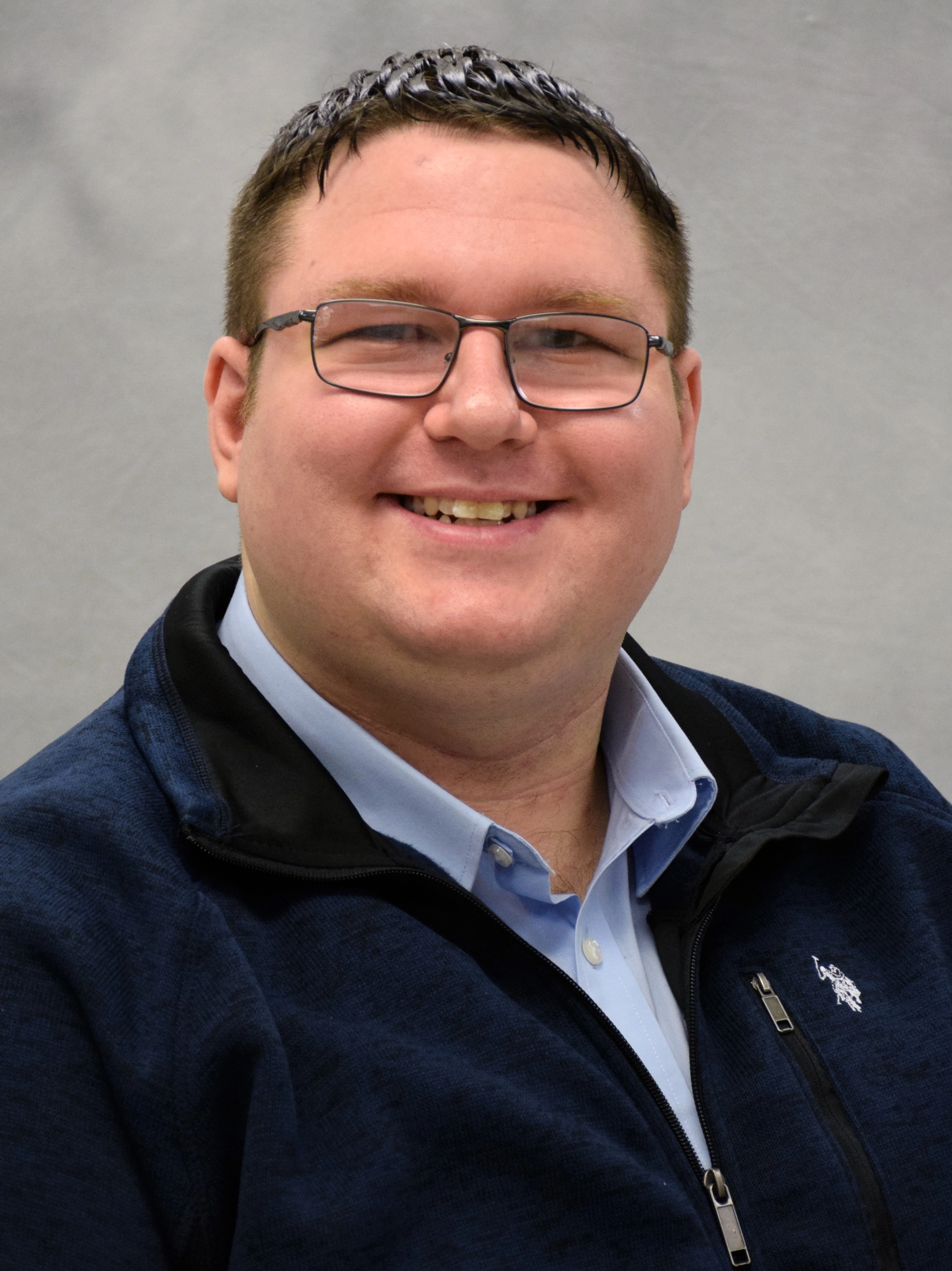 Professional headshot of Trevor DeWall, Cyber Security Professional